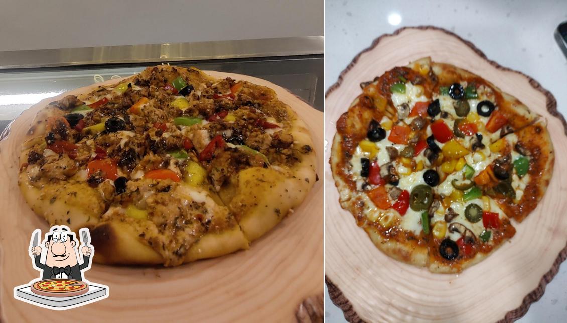 Try out pizza at The CakeWala