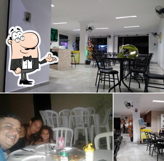 O interior do La Bella Pizza