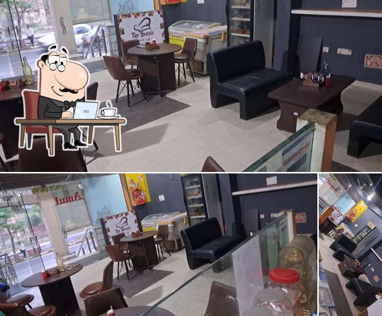 The photo of interior and food at Amul Parlour TBC Cafe fast food