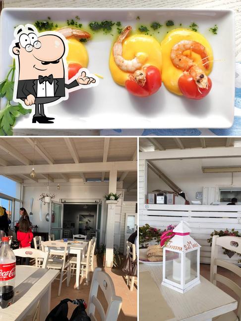 La Taverna sul mare se distingue par sa intérieur et fruit de mer