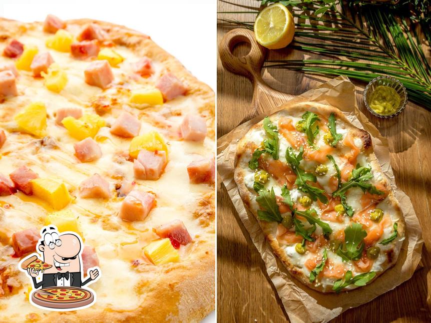 En Fiesta Pizza, puedes degustar una pizza