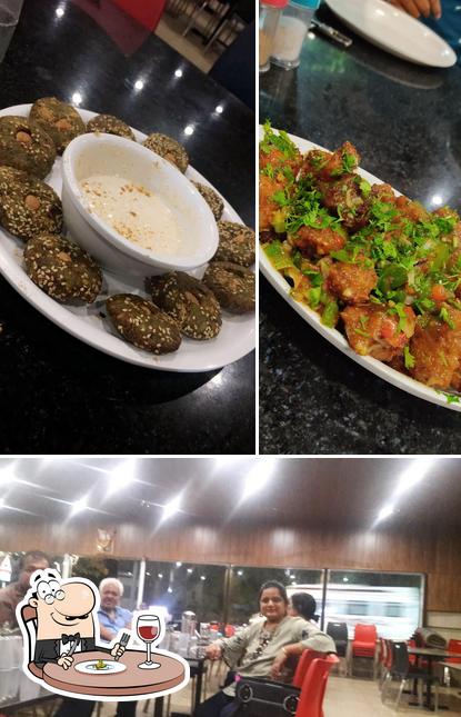 This is the image showing food and interior at Madhuli Restaurant
