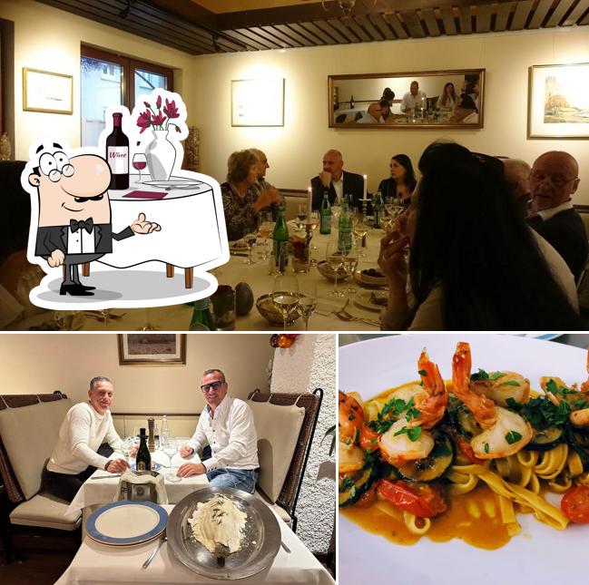 Jetez un coup d’oeil à la photo indiquant la table à manger et nourriture concernant Ristorante Adria