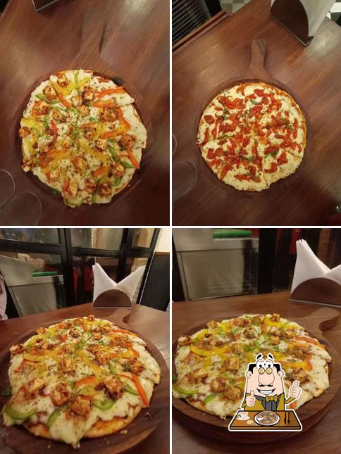 Get pizza at RISO FIRKI PURE VEG RESTAURANTS