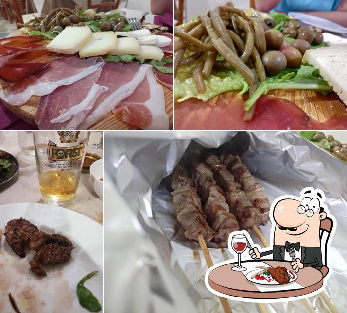 Prenditi i piatti di carne a Il Gobbo Pizzeria Pub Ristorantino