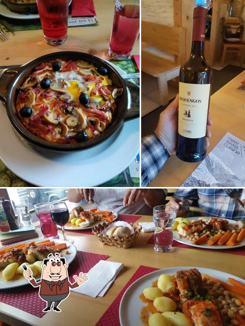 Tra le diverse cose da Restaurant Pasta et Basta si possono trovare la cibo e tavolo da pranzo