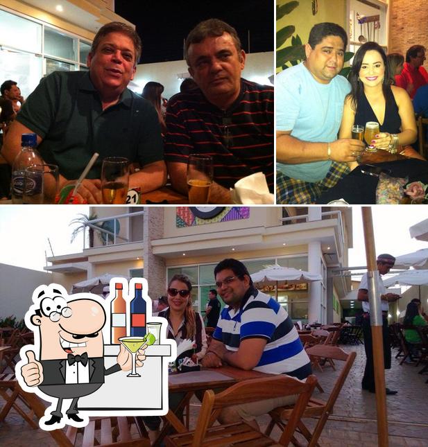 A imagem do Cia do Marisco’s balcão de bar e interior