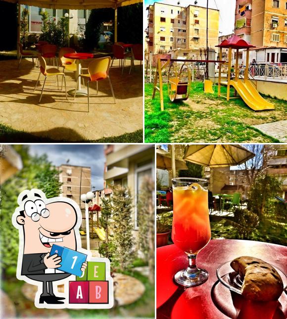 Взгляните на это изображение, где видны игровая площадка и столики в Bar Giardino