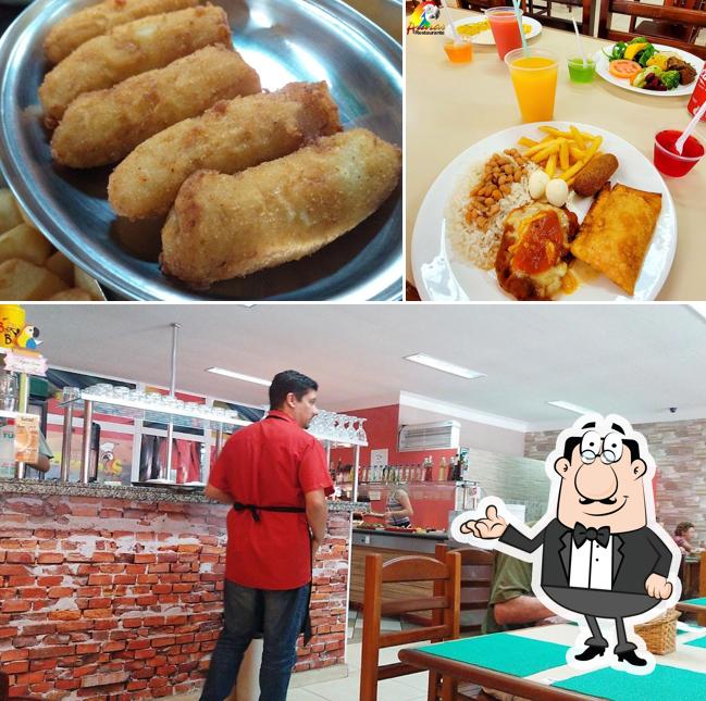 Esta é a imagem apresentando interior e comida no Restaurante Araras