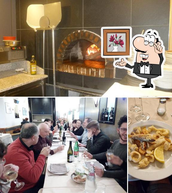 La foto di interni e bancone da bar da Taverna Verde