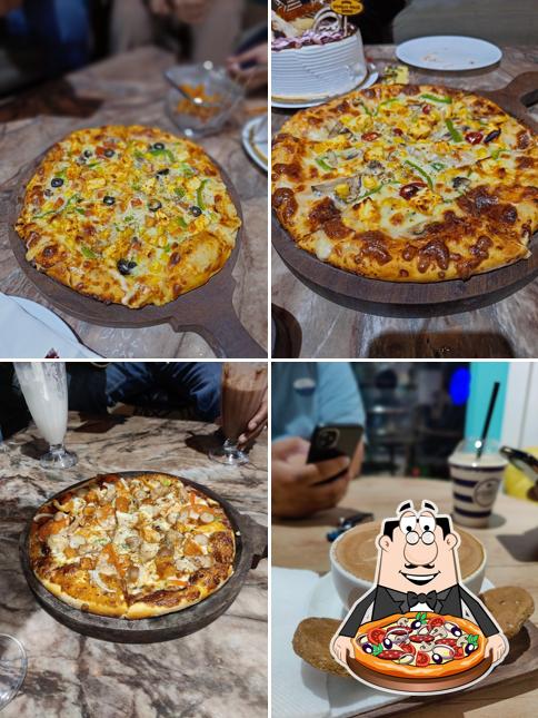 Order pizza at OSLO CAFE & RESTRO