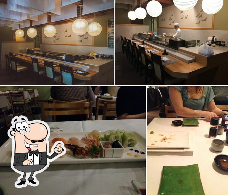 Фото, на котором видны внутреннее оформление и столики в Mye Japanese Restaurant