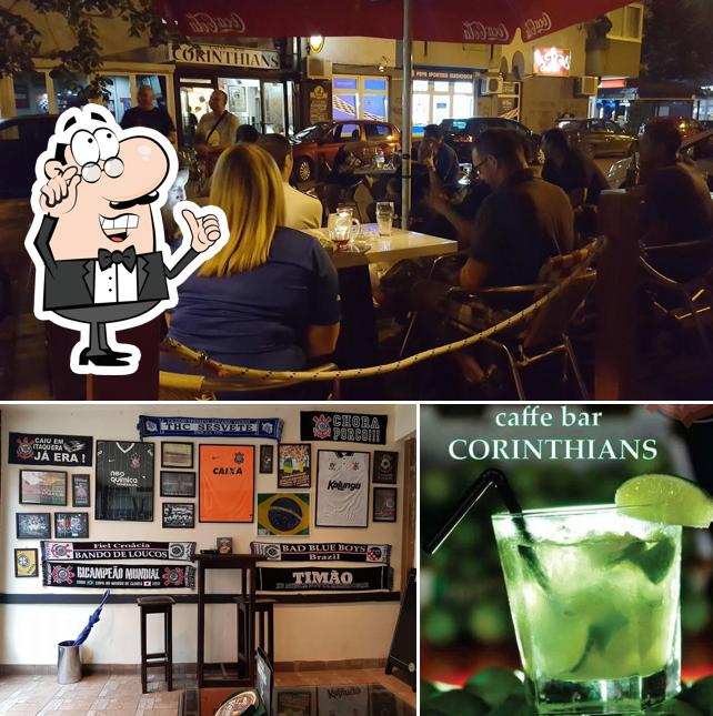 Guarda la foto che mostra la interni e bevanda di Cafe Corinthians