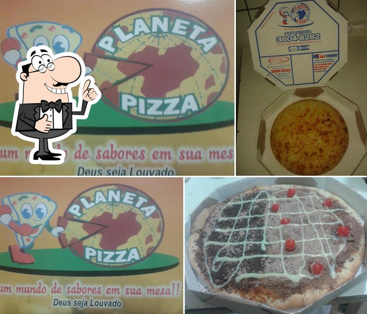 Look at the picture of Planeta Pizza