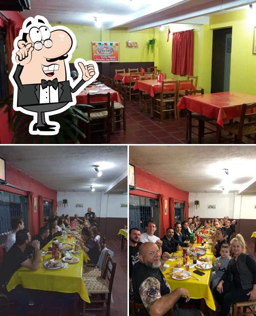 Veja imagens do interior do Pizzaria Scatolla