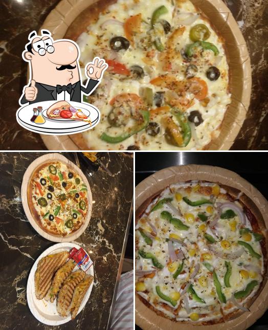 Try out pizza at Cafe My Frappe Rohtak