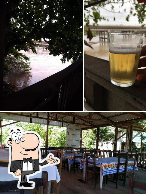 Entre diferentes coisas, interior e cerveja podem ser encontrados no Restaurante Do Salú