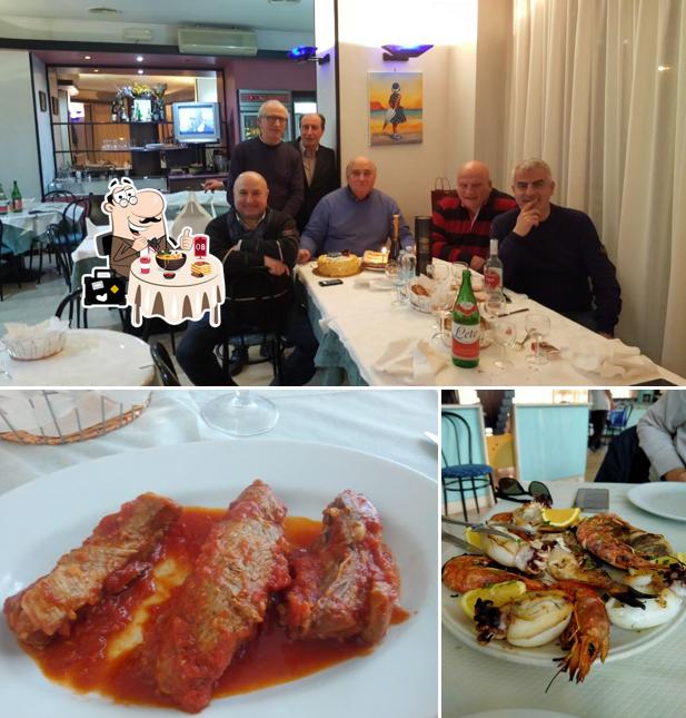 La foto della cibo e tavolo da pranzo di Trattoria Arcadia