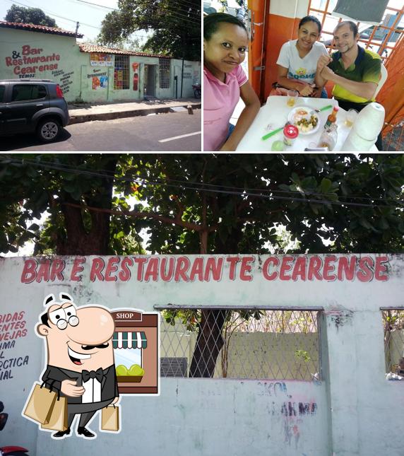 Confira a imagem mostrando exterior e mesa de jantar no Bar & Restaurante Cearense