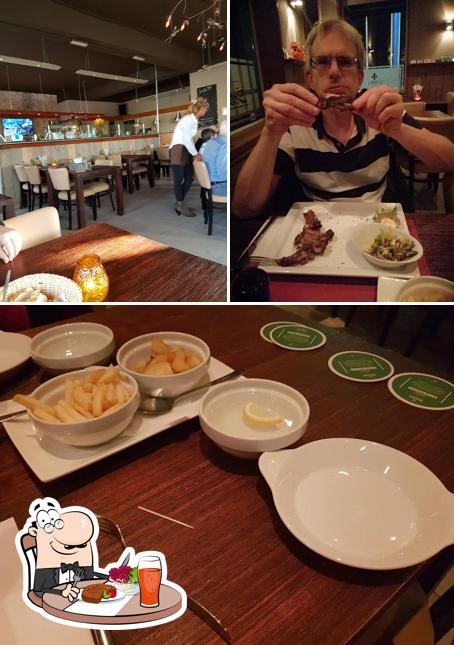 Parmi les différentes choses de la table à manger et la intérieur, une personne peut trouver sur Grand Cafe Schenkel