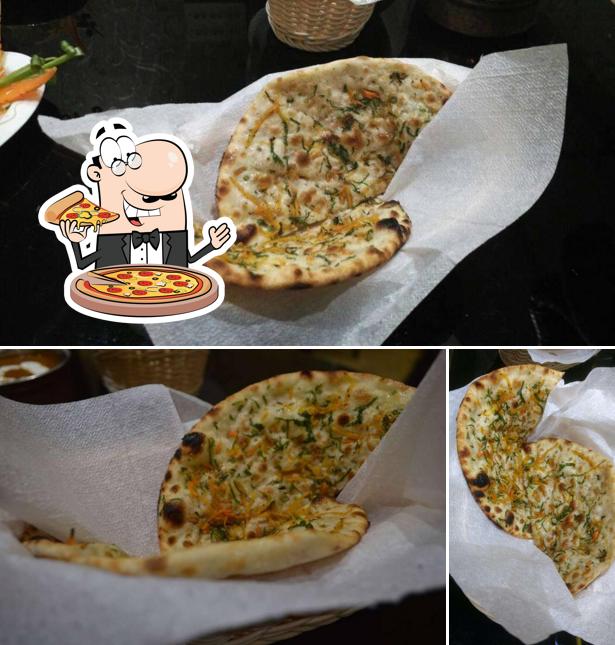 Try out pizza at Ivory Restaurant (Veg-Non Veg-chineese -Indian -Tandoor)