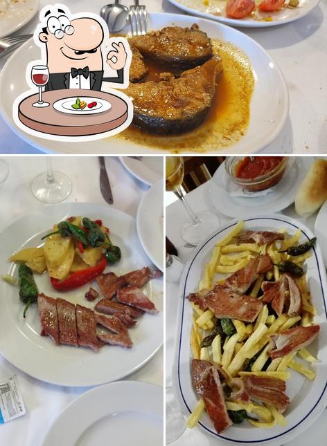 Еда в "Restaurante Hogar Del Pescador / Arrocerias en San Pedro del Pinatar"