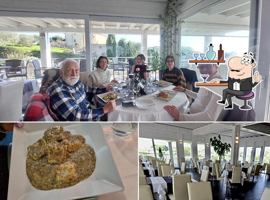 Questa è la immagine che presenta la interni e cibo di Ristorante & Lounge Bar L'Invito