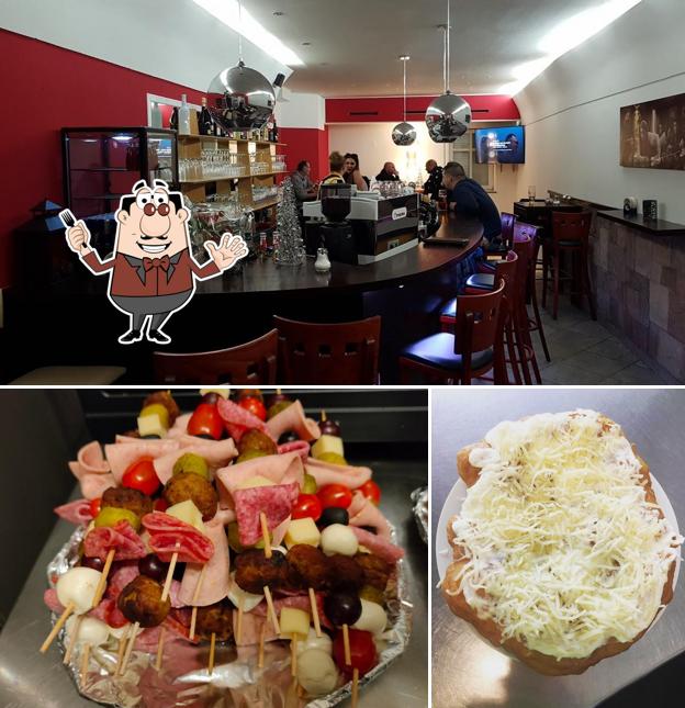 Las fotos de comida y interior en Andrea's Cafe Lounge Bar