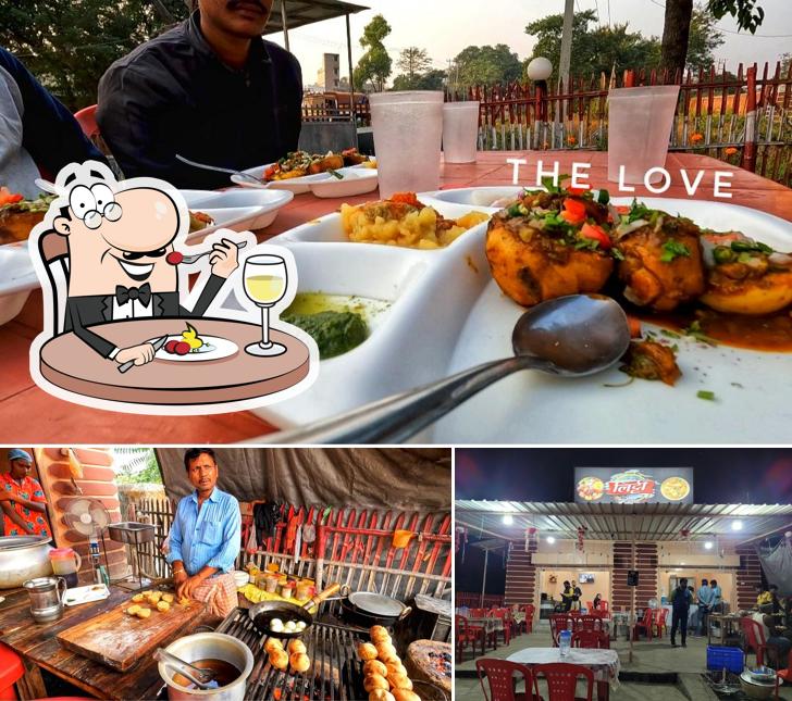 Take a look at the image displaying food and interior at Litti bhojpuriya