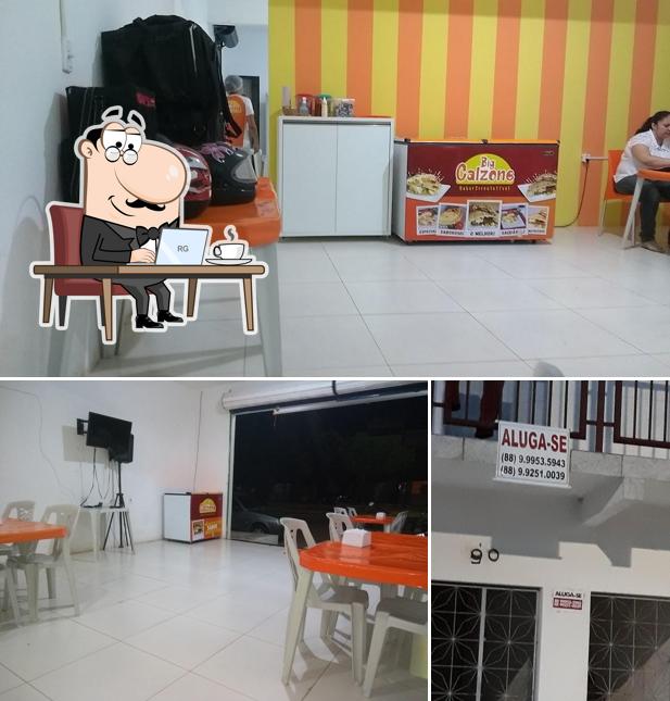 O interior do Big Calzone Delivery