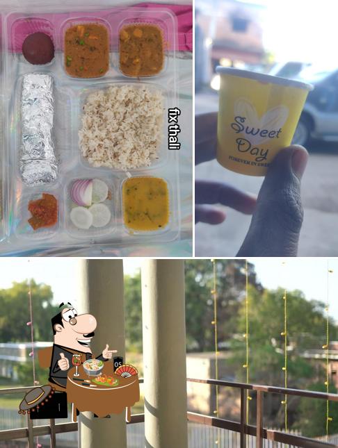 Take a look at the photo showing food and exterior at Hotel sanchi Queen & restaurant