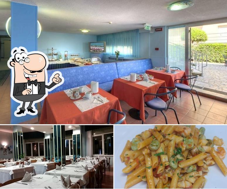 Questa è la immagine che mostra la interni e cibo di Hotel Giannino Ristorante