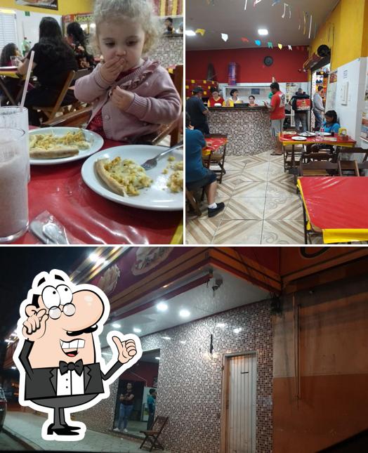 Veja imagens do interior do Pizzaria e esfiharia kasanova ltda