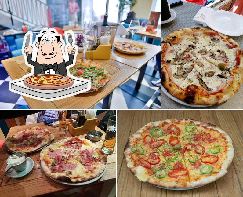 Try out pizza at Snack Bar Bucanero