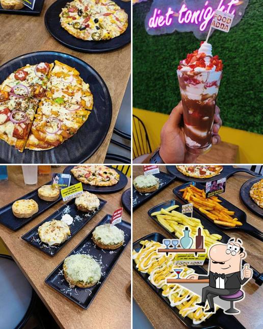Take a look at the photo showing interior and food at Food Adda