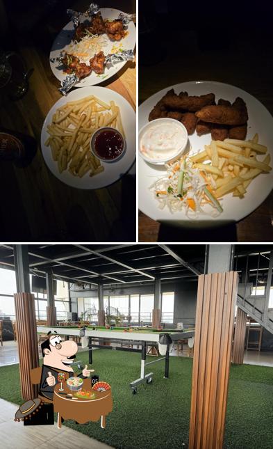 Among different things one can find food and interior at COCO Sky Pub - Rooftop Restobar