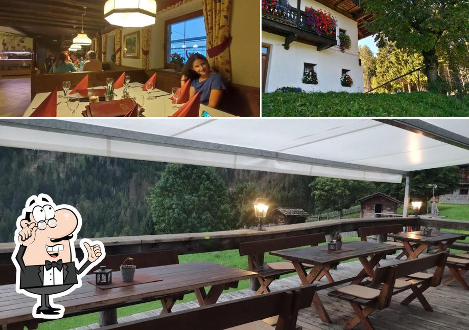 Guarda la foto che raffigura la interni e esterno di Ristorante Walde Alm