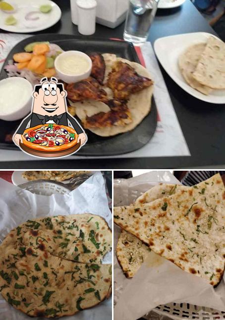 Get pizza at Zaitoon Restaurant, Navalur