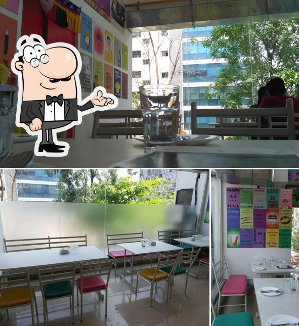 Take a seat at one of the tables at D' Hungry Mogambo