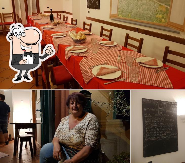 Guarda la immagine che presenta la interni e lavagna di Trattoria da Oreste