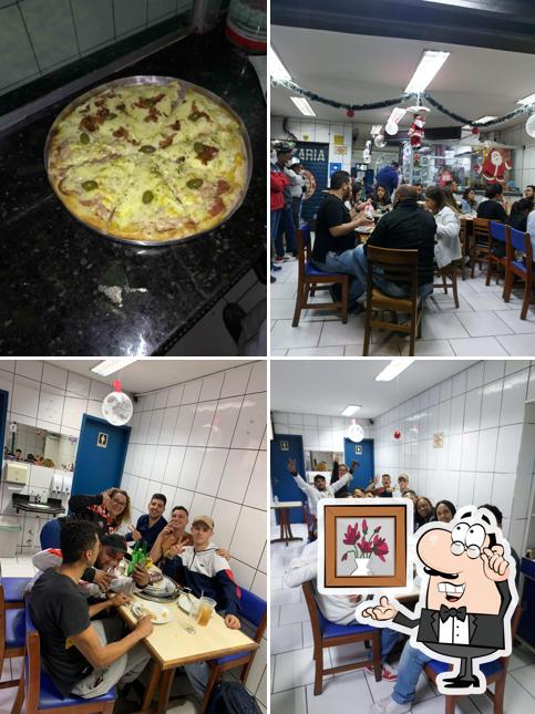 Entre diferentes coisas, interior e comida podem ser encontrados no Point do Noel PIZZARIA e Restaurante