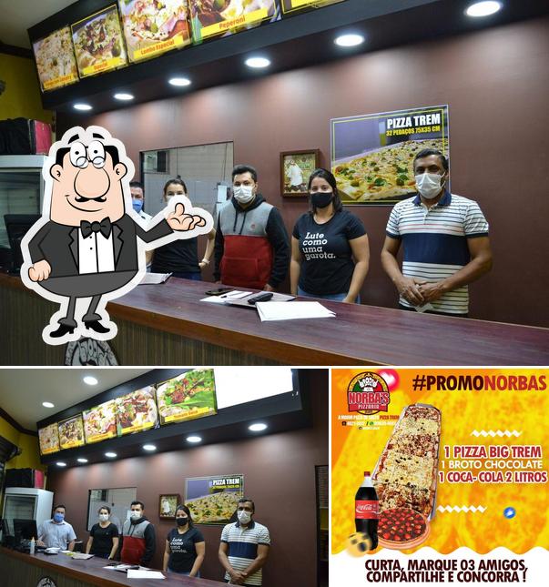 Entre diversos coisas, interior e bebida podem ser encontrados a Norbas Pizzaria