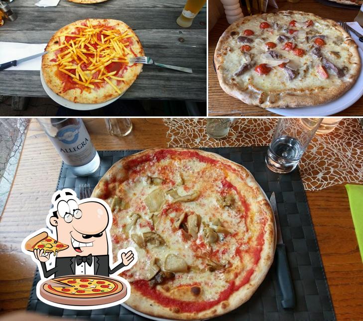 Choisissez des pizzas à Beach Club Sils