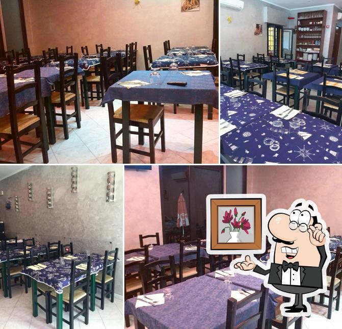 Dai un'occhiata agli interni di Mangia E Bevi Ristorante