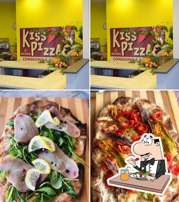 Tra le diverse cose da Pizzeria Kiss Pizza si possono trovare la cibo e interni
