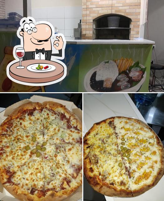 Confira a foto apresentando comida e interior no PIZZARIA VILA REAL - BARUERI