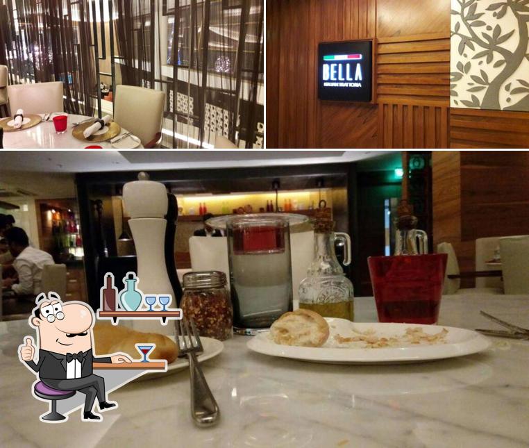 Take a seat at one of the tables at Bella - Crown Plaza