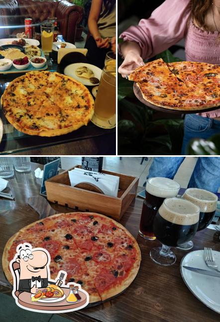 Try out pizza at Common House Restaurant & Bar