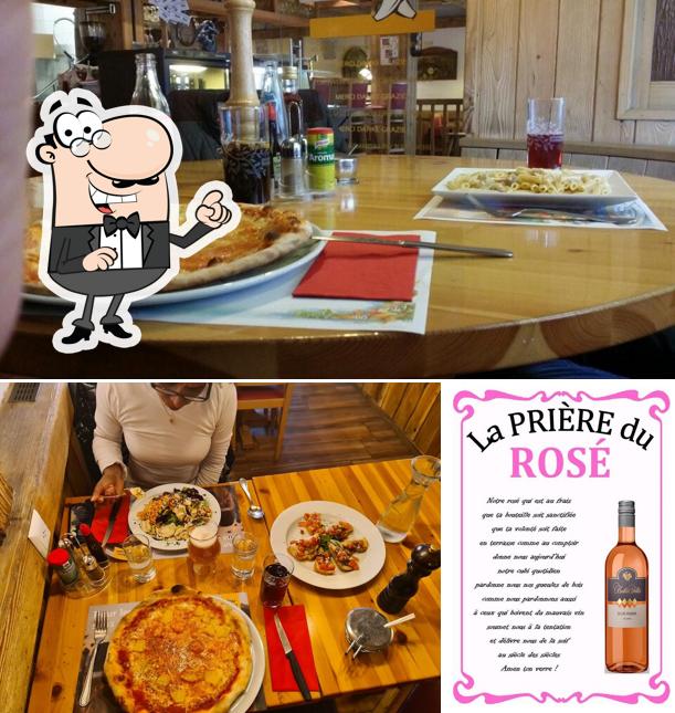 Le Francis Restaurant & Pizzeria si caratterizza per la interni e vino