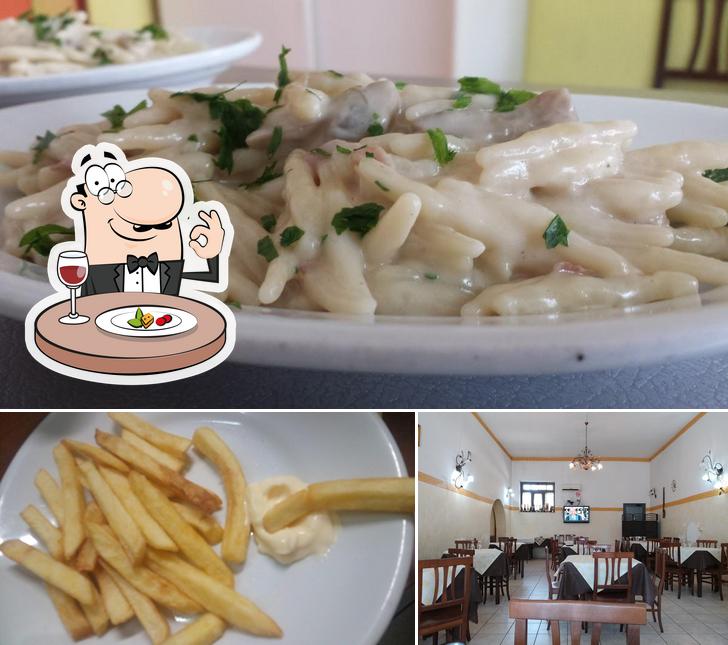 Entre la variedad de cosas que hay en trattoria pizzeria al buon ritiro también tienes comida y interior